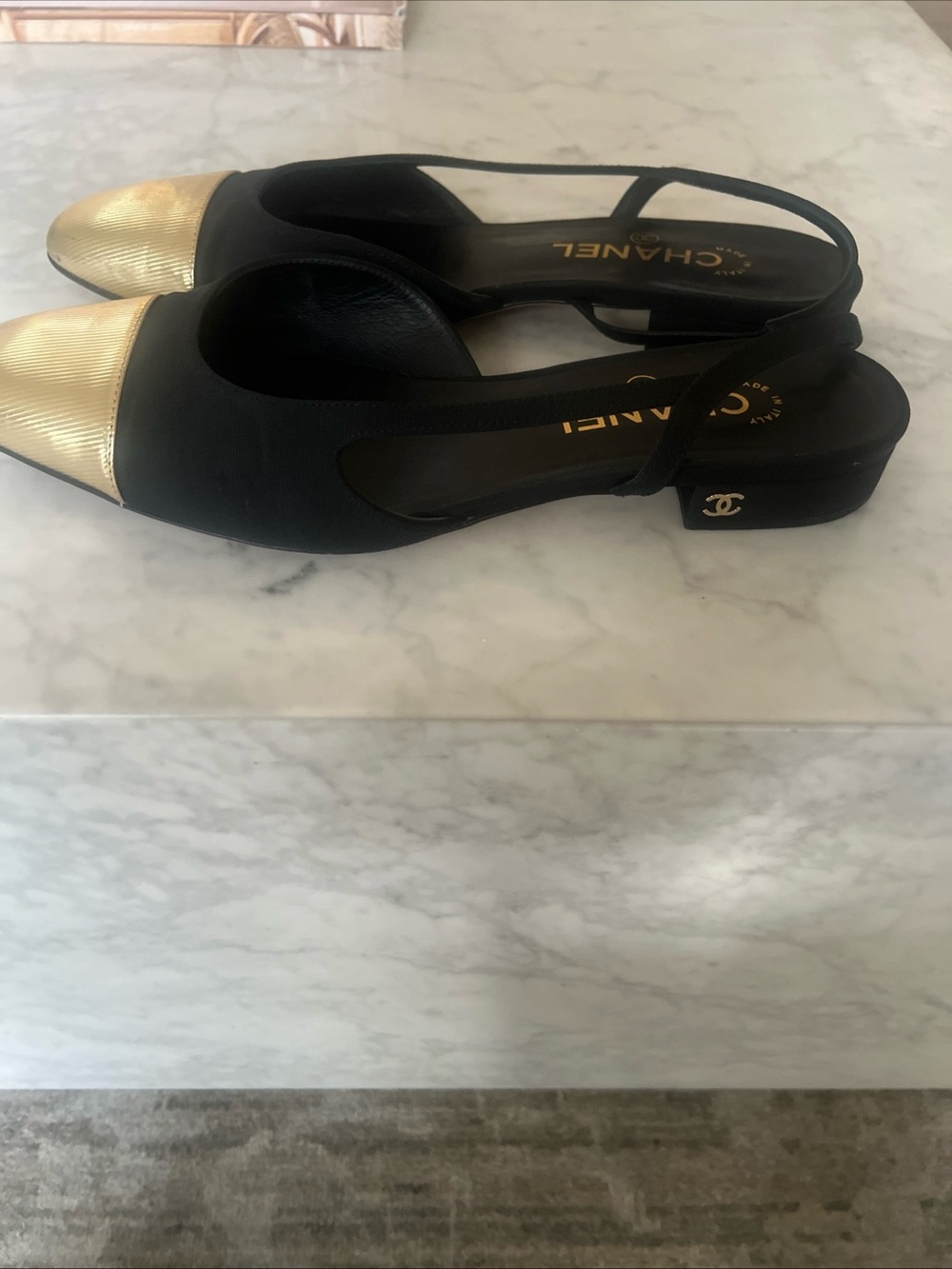 CHANEL Black and Gold Cap-Toe Slingback Mules